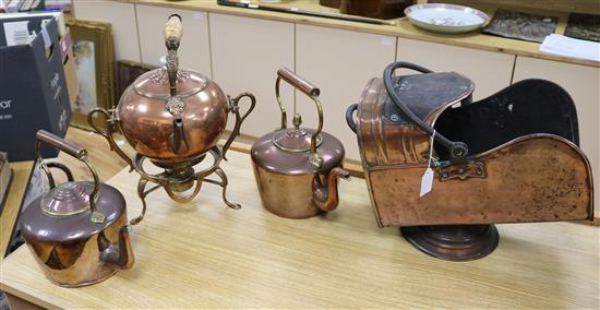 A collection of Victorian copperware, consisting of two kettles, a spirit kettle on stand and a coal helmet (4)